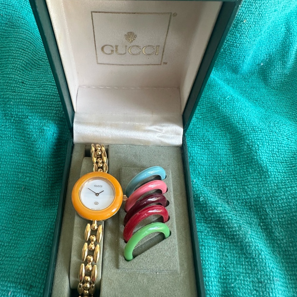 vintage Gucci Gold Bracelet Watch with Multicolor Bezels